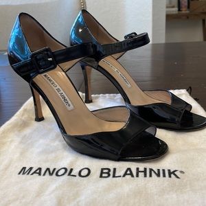 Manolo Blahnik black patent strap sandal.